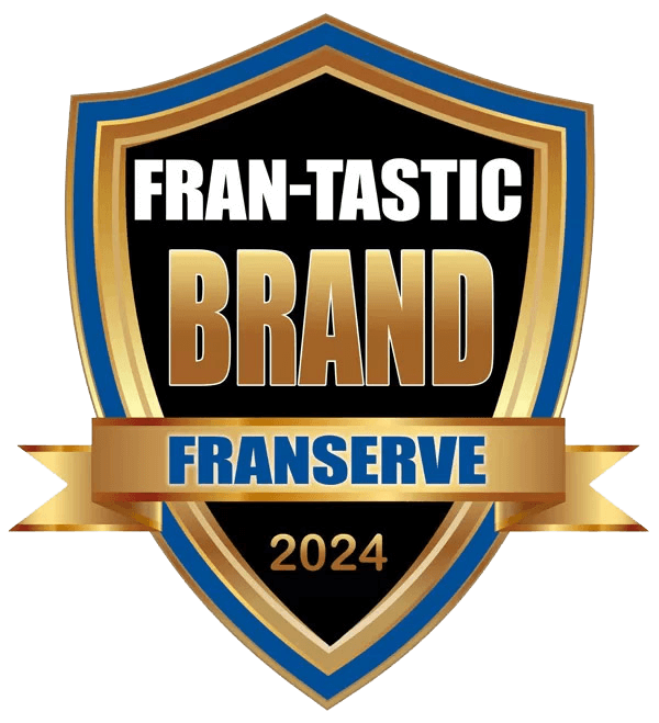 Shield-shaped logo with "Fran-tastic Brand," "Franserve," and "2024" in gold and blue. Features a gold ribbon.
